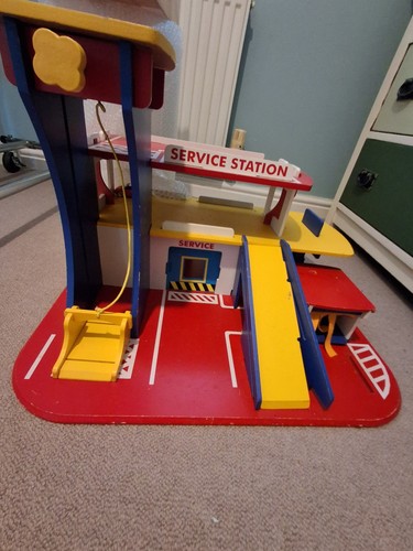 Wooden toy garage with moving - toy,