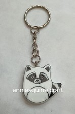 Squishmallow style racoon keychain/bag charm