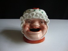 Antique figural  bonneted  baby? lady stoneware inkwell