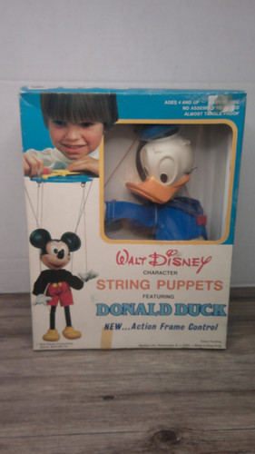 Walt disney string puppet - disney,