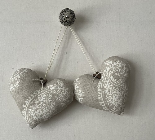 Pair heart door hangers - of,