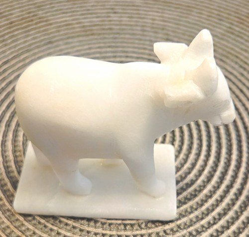 White stone carved cow - white,