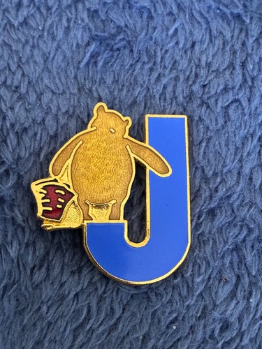 Winnie the pooh letter badge - winnie,