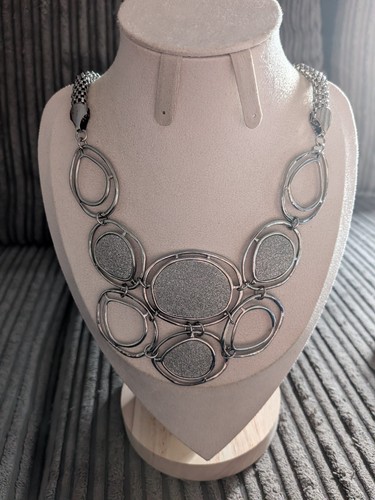 Next silver tone statement bib - statement,
