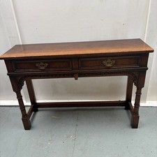 A TITCHMARSH AND GOODWIN JACOBEAN STRESSED OAK TWO DRAWER HALL CONSOLE / SIDE TA