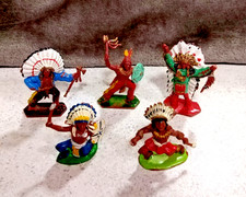 A variety of plastic figures: Guards, soldiers, Red Indians, and some cars!