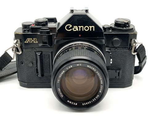 Canon black analog slr - a-1,