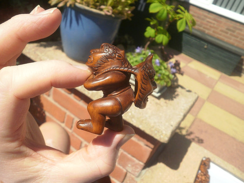 Hand carved wood netsuke oni - hand,