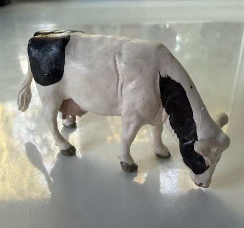 Britains grazing cow - britains,