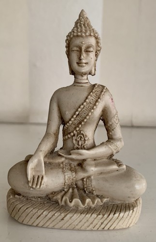 Meditating buddha statue - meditating,