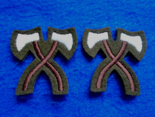 A PAIR NEW BRITISH MILITARY PIONEERS WOVEN TRADE ARM BADGES
