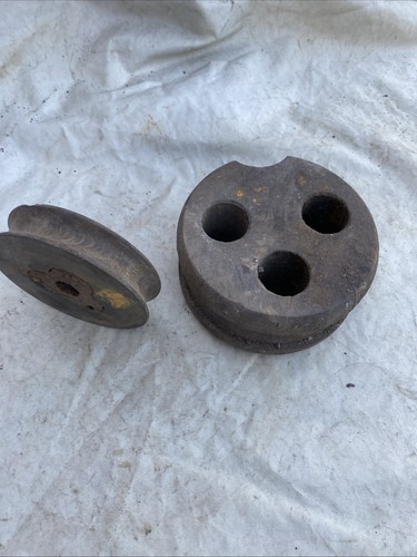 Antique deadeye and pulley - and,