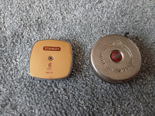 Two vintage tape measures - two,