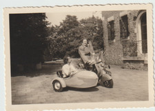 Photo Woman motor scooter on a