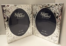 VINTAGE 1980s SILVER PLATED HINGED ORNATE EMBOSSED DOUBLE PHOTO FRAME - 8" X 10"