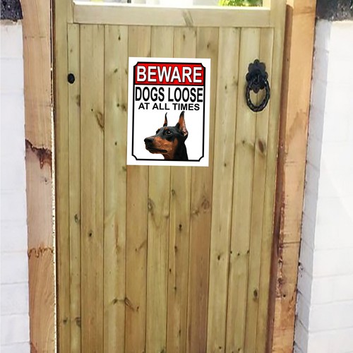 Beware dogs loose - beware, doberman