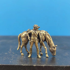 Brass cowboy riding - , miniature