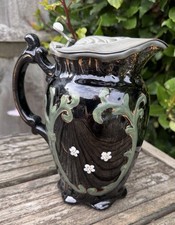 ANTIQUE JACKFIELD BLACK/FLORAL PEWTER LIDDED JUG JETWARE