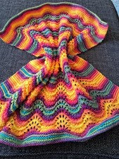 Hand knitted multi coloured