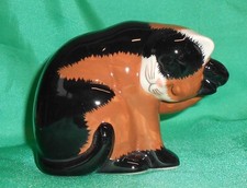 Quail Pottery Cat Washing