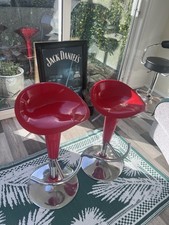Pair of red and chrome  kitchen bar stools, height adjustable, used