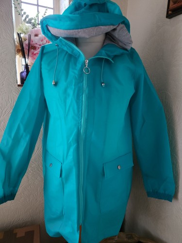 Turquoise rubberised raincoats