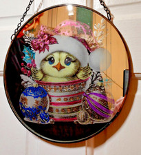 Etched and coloured image on