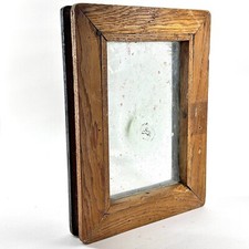 Antique Bullseye Glass Panel in Wooden Encasement