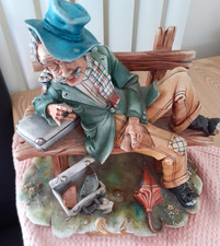 Gianni- Capodimonte Tramp Figure On Bench Made In Italy #112 - 9".W. 9.5".H.