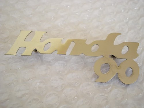 Emblem leg shield front cover - emblem,