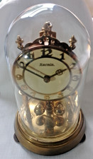 HERMLE GERMAN TORSION DOMED MECHANICAL  ANNIVERSARY CLOCK - gold swinging balls.