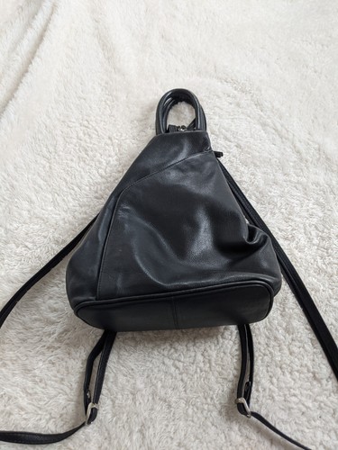 Sculptural black leather - sculptural,