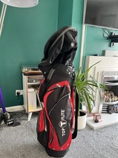 Top flite 8 pocket 7 way trolly bag with rain covers