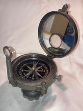 Vintage military brass-bound compass by Elliott Bros with stand.