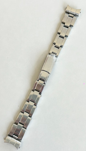 Riveted rolex oyster - a,