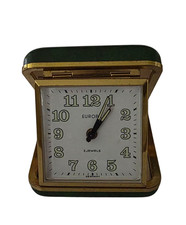 Folding travel alarm clock
