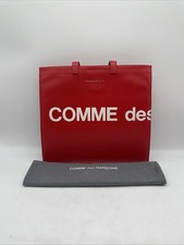 Comme des Garcons Huge Logo