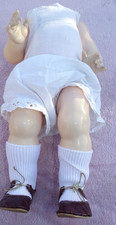 ANTIQUE K*R DOLL BODY - DAMAGED - WITH CLOTHES -  CELLULOID ? MAY BE OF USE