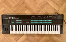 Yamaha DX7 Synthesizer Mk1 with original stand, soft case and manual.