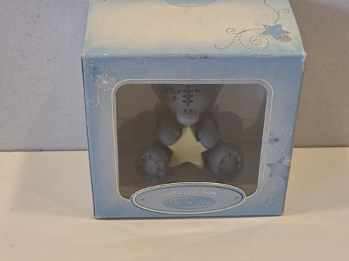 You bear figurine - to,