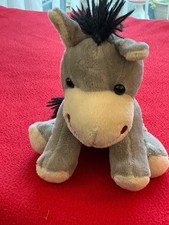 Mini feet small grey sitting