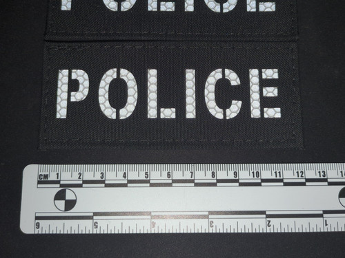 Lasercut reflective police - lasercut, "police"