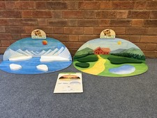 A pair of Holztiger dioramas