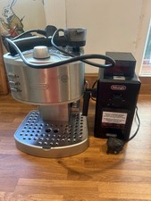 Chrome Delonghi coffee machine and coffee grinder