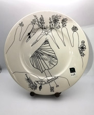A Poole Pottery 'Creation of Earth' pattern charger, designed by Uri Geller