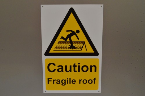Caution fragile roof sign - fragile,