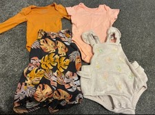 Set Of Two Rompers And Vests