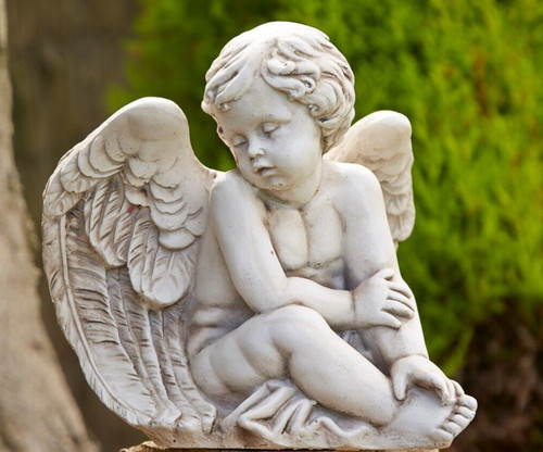 Concrete sitting angel