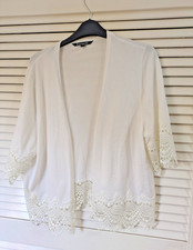 Ladies Bon Marche ivory shrug/cardigan size 16/18. Lace to hem and sleeves.