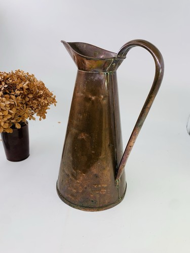 Large antique copper jug